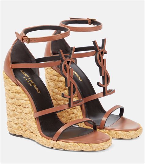 ysl raffia cassandra|Cassandra 115 leather and raffia wedge sandals in brown.